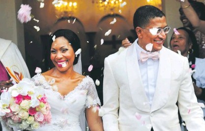 Lerato Mbele with her husband on her wedding day. husband, spouse, partner